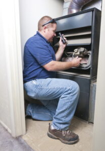 heater-being-worked-on-by-technician