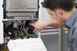 technician-servicing-electric-heater