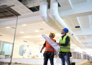 technicians-inspecting-a-commercial-HVAC-system