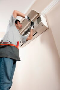 technician-performing-maintenance-on-a-ductless-mini-split-air-handler