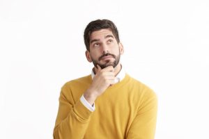 person-with-chin-on-hand-and-thoughtful-expression